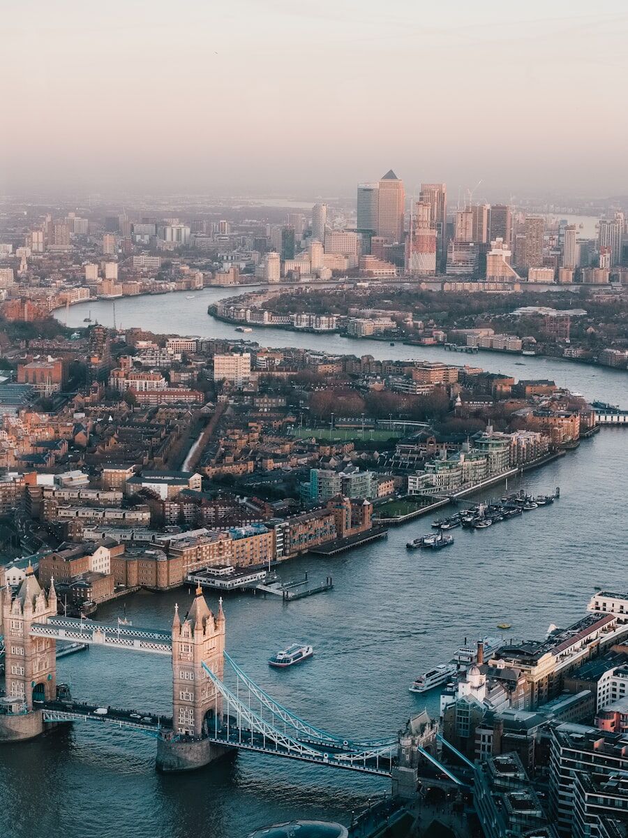 Aerial view of London along the Thames at dusk